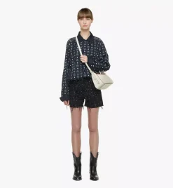 Aren Flap Hobo Bag In Embossed Monogram Leather