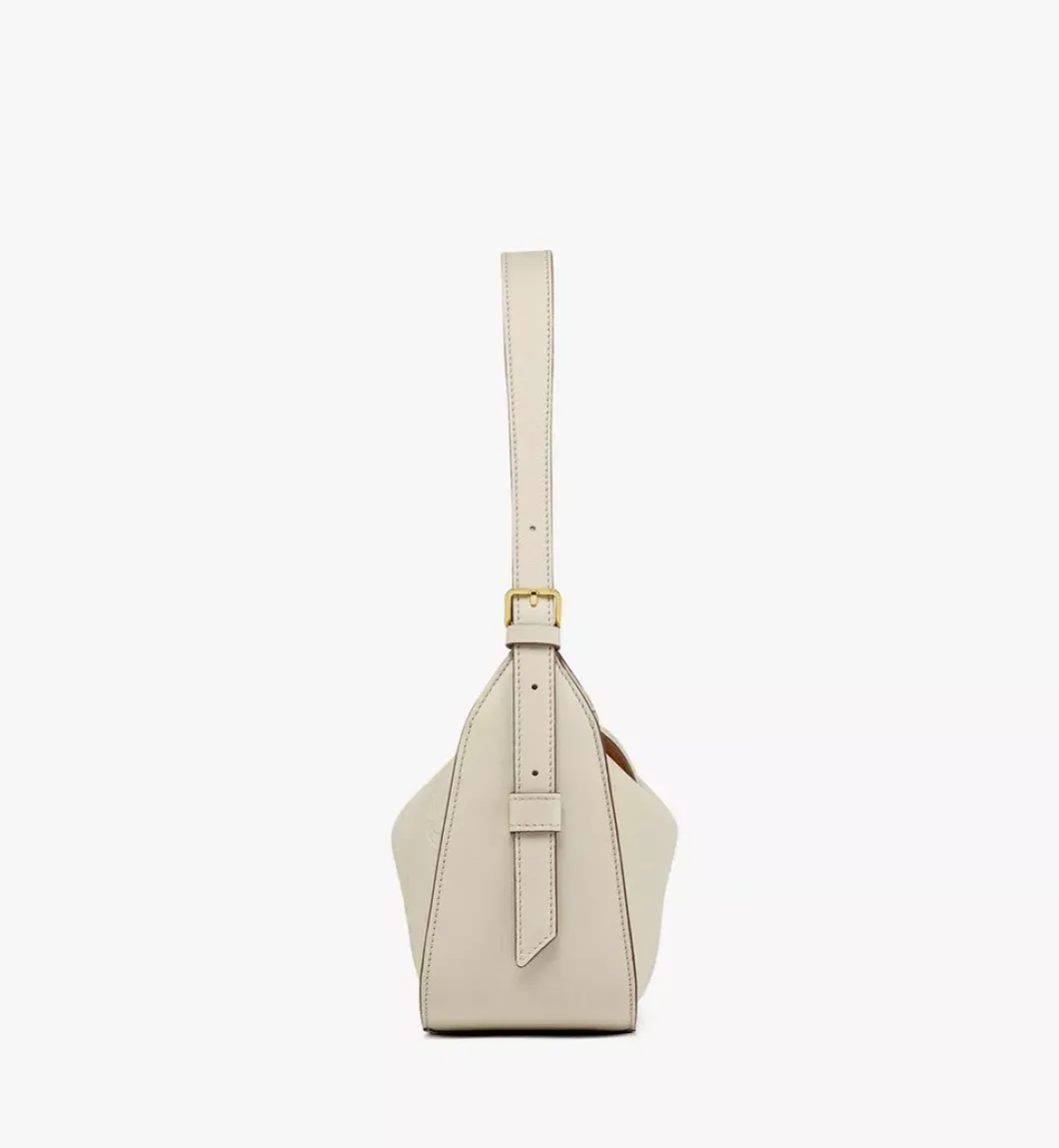Aren Flap Hobo Bag In Embossed Monogram Leather
