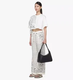 Aren Flap Hobo Bag In Embossed Monogram Leather